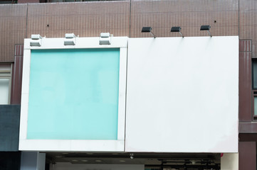 Large blank billboard on a street wall, banners with room to add your own text