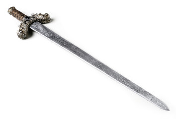 Closeup of vintage metal sword decorated with gems on white background