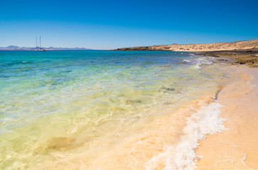 paradise beach with clear ocean water in La Graciosa Island