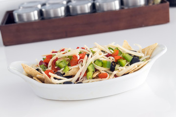 ready to go to the oven loaded cheese nacho