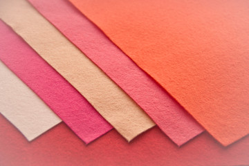 Felt fabric sheets.Pieces of coloured felt in different colours.  Felt craft abstract handicraft background for handmade and creative.