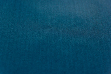 Beautiful dark blue paper background. Empty space concept. Blue paper texture background. Colored cardboard fibers and grain.