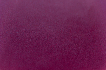 Beautiful puple paper background. Empty space concept. Purple paper texture background. Colored cardboard fibers and grain.