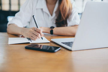 hands of business working on documents during working process in office desk.Searching data and information on internet concept.