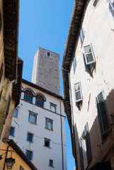 Fototapeta na wymiar Scenic view of characteristic houses and tower of the dell'Olio tower
