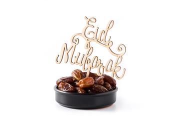 Dates and Eid Mubarak message isolated on white background