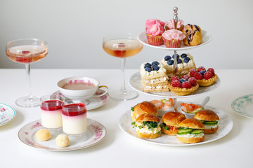 Afternoon tea with mini brioche canapes and selection of sweets