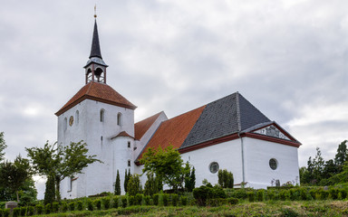 Nordborg Church with tower and Garden. In Sonderborg, Island Als, South Denmark.