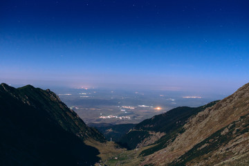 The Transfagarasan highway in Romania at night time, long exposure photography by moonlight