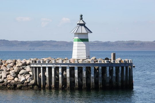 Harbor and lighthouse of Ebeltoft in Denmark