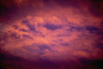 Naklejka na ściany i meble Dark dramatic cloudy sky during the sunset_