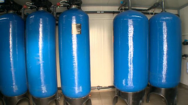 Blue oxygen water tanks used for water cleaning treatment