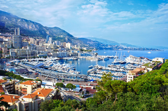 Panoramic view of luxury yachts and apartments in harbor of  of Monte Carlo, Monaco