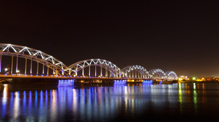 Railway bridge at night in winter, Riga