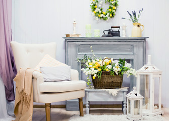 living room with flowers and armchair
