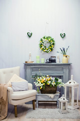 living room with flowers and armchair