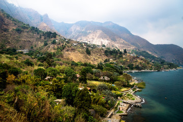 Fototapeta na wymiar Aerial view on the coast and village of Santa Cruz at Lago de Atitlan, Guatemala