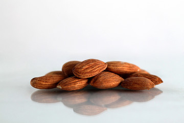 Almonds on white background.