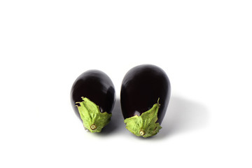 Two eggplants or aubergines isolated on white background.