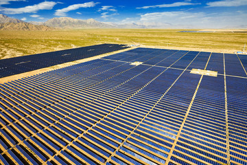 Aerial photography of a large solar photovoltaic power station in the desert
