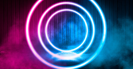 Background of empty stage, room. Reflection on wet pavement, concrete. Neon blurry lights. Neon circle figure in the center, smoke