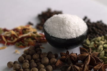 Salt and pepper with other spices.
