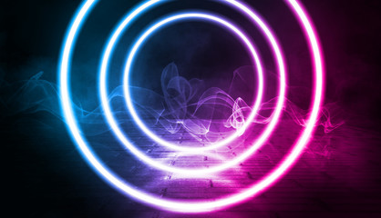 Background of empty stage, room. Reflection on wet pavement, concrete. Neon blurry lights. Neon circle figure in the center, smoke