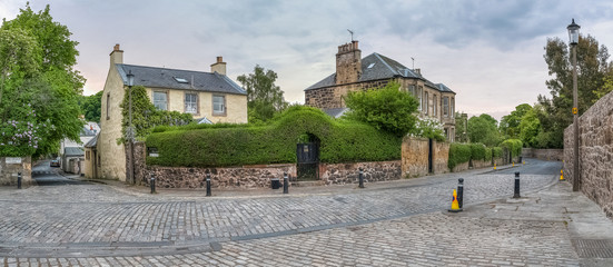 Cobblestone street of Duddingston, close to Holyrood park, Scotland, UK