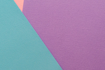 Sheets of colored paper. Pink, urquoise, purple.