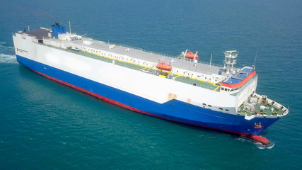 Aerial image of a Large RoRo (Roll on/off) Vehicle carrier vessel cruising the Mediterranean sea