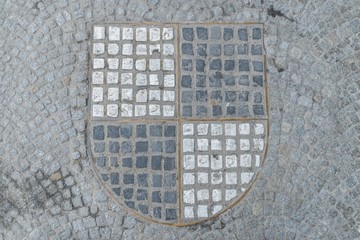 Pflastersteine in Form des schwarz weiß Wappen der Hohenzollern, Deutschland