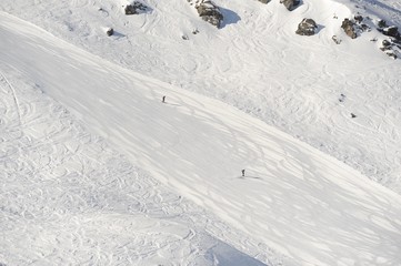 Skiing people in winter at ski slope