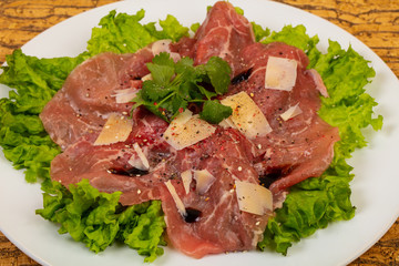 Beef carpaccio with parmesan cheese