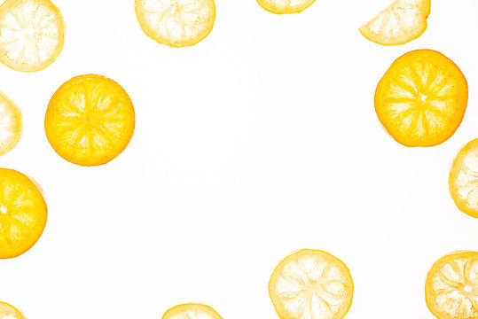 Sweet candied orange and lemon slice isolated on a white background. Flat lay, top view. Fruit composition