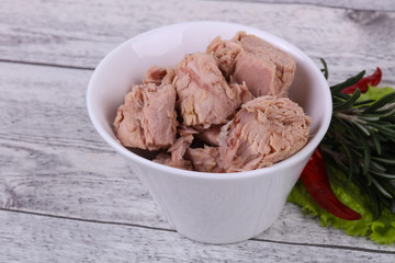 Tasty canned tuna fish in the bowl