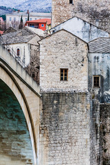 Fototapeta na wymiar Fragment of Stari Most a 16th-century Ottoman bridge over Neretva river in the city of Mostar in Bosnia Herzegovina