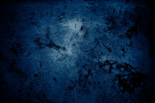 Blue textured grunge concrete dark wall background