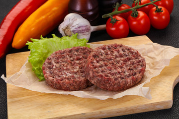 Raw burger cutlet