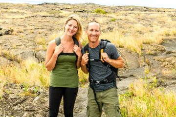 Couple at the Hawaii Volcano National Park, Pu u Loa petroglyphs, amazing walk into the past.