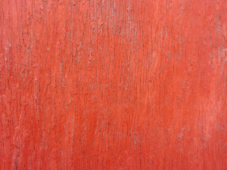 red planks aged door surface with old paint remains