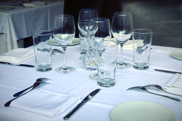 dinner setting plate and glass napkin cutlery tableware empty place romantic restaurant table