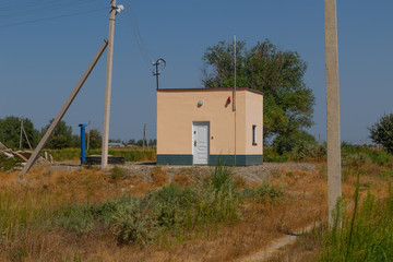 Fototapeta na wymiar Industrial zone in the steppe. Industrial building in the steppe.