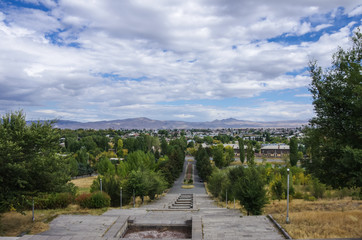 Fototapeta na wymiar Panorama of Gyumri city from Mother Armenia statue in Memorial Victory Park. Gyumri, Armenia,