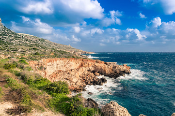 Ghar Lapsi Bay, Malta. Scenic coastline with rocky swimming cove and turquoise water