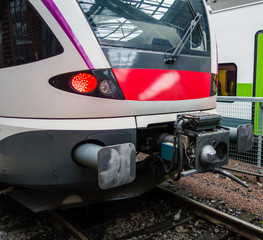 Commuter train locomotive at the station with connector for connecting wagons