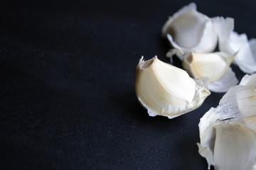 Fototapeta na wymiar garlic on black background