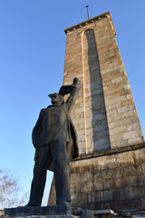 A symbol of the socialism in Bulgaria - ruined big concrete monument of a revolutionary man built...