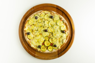 Vegetarian zucchini pizza on white background