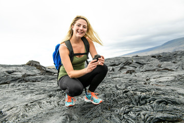 The Woman Tourist visiting the lava field at hawaii