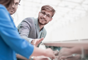 businesspeople standing in the modern office